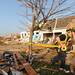 A Dexter firefighter tapes off the most-damaged houses March 16, 2012, in the Huron Farms neighborhood after a tornado hit Dexter.  Angela J. Cesere | AnnArbor.com
